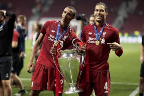 1st June 2019, Wanda Metropolitano stadium, Madrid, Spain; UEFA Champions League Final, Tottenham Hotspur versus Liverpool FC; Virgil van Dijk and Joel Matip of Liverpool celebrate with the UEFA Champions League trophy  ActionPlus12140388 ShaunxBrooks