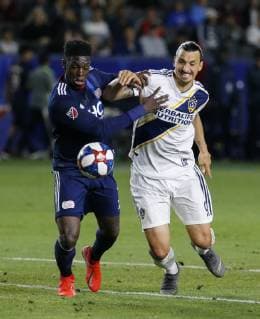 June 2, 2019 - Los Angeles, California, U.S - LA Galaxy forward Zlatan Ibrahimovic (9) of Sweden, and New England Revolution defender Jalil Anibaba (3) vie for the ball during the 2019 Major League Soccer MLS, Fussball Herren, USA match between LA Galaxy and New England Revolution in Carson, California, June 2, 2019. MLS 2019: New England Revolution 2:1 LA Galaxy - ZUMAc68_ 20190602_zaf_c68_013 Copyright: xRingoxChiux