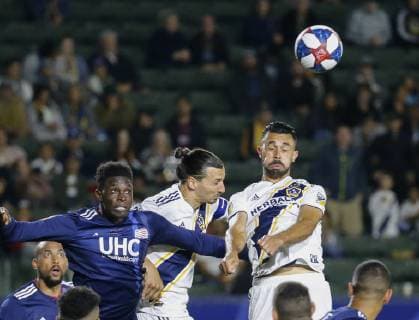 June 2, 2019 - Los Angeles, California, U.S - LA Galaxy forward Zlatan Ibrahimovic (9) of Sweden, and defender Giancarlo Gonzalez (21) fight for a head ball against New England Revolution defender Jalil Anibaba (3) during the 2019 Major League Soccer MLS, Fussball Herren, USA match between LA Galaxy and New England Revolution in Carson, California, June 2, 2019. MLS 2019: New England Revolution 2:1 LA Galaxy - ZUMAc68_ 20190602_zaf_c68_028 Copyright: xRingoxChiux