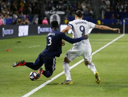 June 2, 2019 - Los Angeles, California, U.S - LA Galaxy forward Zlatan Ibrahimovic (9) of Sweden, vies with New England Revolution defender Jalil Anibaba (3) during the 2019 Major League Soccer MLS, Fussball Herren, USA match between LA Galaxy and New England Revolution in Carson, California, June 2, 2019. MLS 2019: New England Revolution 2:1 LA Galaxy - ZUMAc68_ 20190602_zaf_c68_036 Copyright: xRingoxChiux