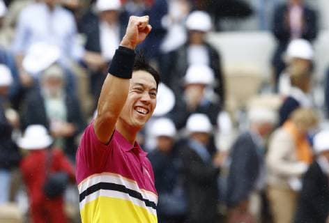 Tennis: French Open Kei Nishikori of Japan celebrates after defeating home country favorite Benoit Paire 6-2, 6-7(8), 6-2, 6-7(8), 7-5 in the fourth round of the French Open tennis tournament in Paris on June 3, 2019. 