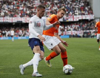 Ross Barkley of England tackled by Matthijs de Ligt of Netherlands during the UEFA Nations League match at D. Afonso Henriques Stadium, Guimaraes. Picture date: 6th June 2019. Picture credit should read: David Klein Sportimage EDITORIAL USE ONLY. No use with unauthorised audio, video, data, fixture lists, club league logos or live services. Online in-match use limited to 120 images, no video emulation. No use in betting, games or single club league player publications. SPI-0093-0035