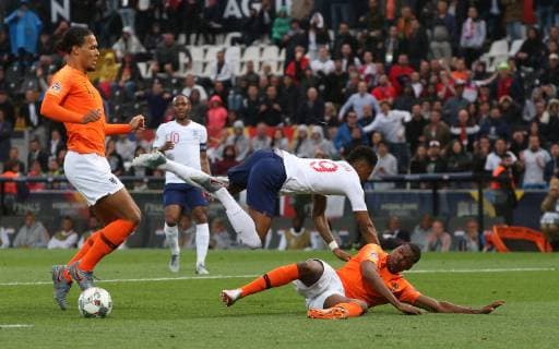 Netherlands v England UEFA Nations League Semi-Final Denzel Dumfries of Netherlands tackles Marcus Rashford of England in the penalty area during the UEFA Nations League Semi-Final match at Estadio D. Afonso Henrique, Guimaraes Content Not Available For UK Newspapers Copyright: xPaulxChestertonx FIL-13327-0036