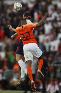 Ben Chilwell of England clashes with Denzel Dumfries of Netherlands during the UEFA Nations League match at D. Afonso Henriques Stadium, Guimaraes. Picture date: 6th June 2019. Picture credit should read: David Klein Sportimage EDITORIAL USE ONLY. No use with unauthorised audio, video, data, fixture lists, club league logos or live services. Online in-match use limited to 120 images, no video emulation. No use in betting, games or single club league player publications. SPI-0093-0075