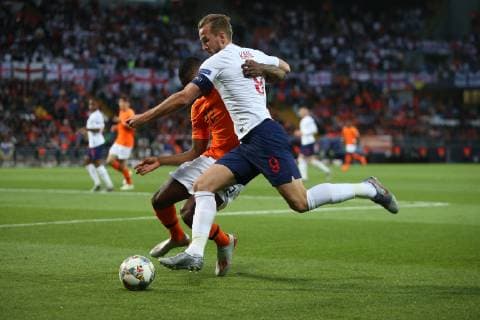 Netherlands v England UEFA Nations League Semi-Final Denzel Dumfries of Netherlands and Harry Kane of England battle for the ball during the UEFA Nations League Semi-Final match at Estadio D. Afonso Henrique, Guimaraes Content Not Available For UK Newspapers Copyright: xPaulxChestertonx FIL-13327-0072