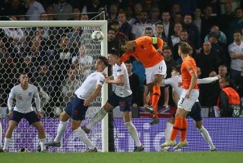 Netherlands v England UEFA Nations League Semi-Final Virgil van Dyke of Netherlands heads for goal during the UEFA Nations League Semi-Final match at Estadio D. Afonso Henrique, Guimaraes Content Not Available For UK Newspapers Copyright: xPaulxChestertonx FIL-13327-0172