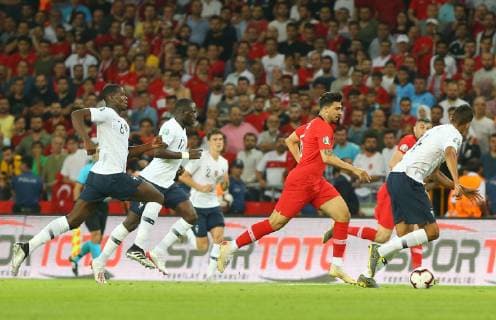 Ozan Tufan of Turkey and Paul Pogba 6 , Moussa Sissoko 17 , Raphael Varane of France during the Euro 2020 football qualification match between Turkey and France at the Buyuksehir Belediyesi stadium in Konya, on June 8, 2019. 