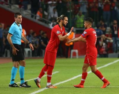 Yusuf Yazici (L) and Cengiz Under (R) of Turkey during the Euro 2020 football qualification match between Turkey and France at the Buyuksehir Belediyesi stadium in Konya, on June 8, 2019. 