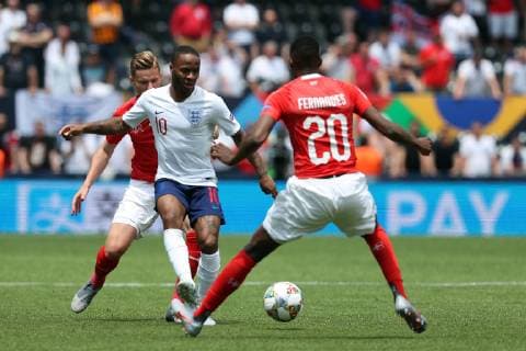 June 9, 2019 - Guimaraes, Portugal - Raheem Sterling of England (L) vies with Switzerland s defender Kevin Mbabu (R ) during the UEFA Nations League Third-place football match between Switzerland and England, at the Dom Afonso Henriques stadium in Guimaraes, Portugal, on June 9, 2019. Switzerland vs England - UEFA Nations League Third-place match  - ZUMAn230 20190609_zaa_n230_061 Copyright: xPedroxFiuzax