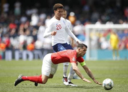 Dele Ali of England and Granit Xhaka of Switzerland during the UEFA Nations League match at D. Afonso Henriques Stadium, Guimaraes. Picture date: 9th June 2019. Picture credit should read: David Klein Sportimage EDITORIAL USE ONLY. No use with unauthorised audio, video, data, fixture lists, club league logos or live services. Online in-match use limited to 120 images, no video emulation. No use in betting, games or single club league player publications. SPI-0095-0045