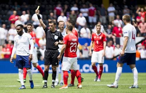 9th June 2019, St& xe1;dio D Afonso Henriques, Porto, Portugal; UEFA Nations League Football 3rd placed final, England versus Switzerland; The referee gives a yellow card to Danny Rose of ENG for a poor tackle  ActionPlus12142575 NikolaxKrstic