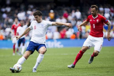 9th June 2019, St& xe1;dio D Afonso Henriques, Porto, Portugal; UEFA Nations League Football 3rd placed final, England versus Switzerland; Harry Maguire of ENG passes before the contact from Seferovic of SUI  ActionPlus12142577 NikolaxKrstic