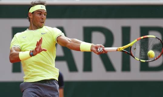 (190609) -- PARIS, June 9, 2019 (Xinhua) -- Rafael Nadal of Spain competes during the men s singles final with Dominic Thiem of Austria at French Open tennis tournament 2019 at Roland Garros, in Paris, France on June 9, 2019. (Xinhua Han Yan) (SP)FRANCE-PARIS-TENNIS-ROLAND GARROS 