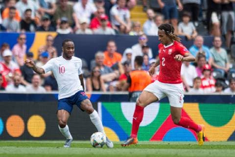 Guimaraes, Portugal, 09.06.2019, UEFA Nations League, 3. Platz, Schweiz - England, Raheem Sterling (England) and Kevin Mbabu (Switzerland) battle for the ball ( Defodi-09-531-002202