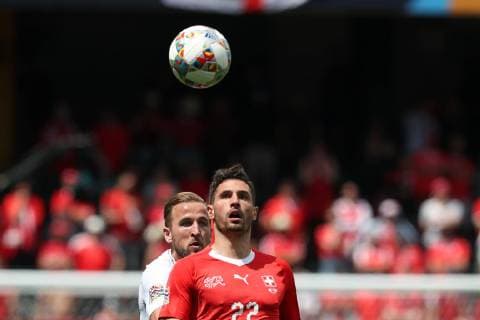 June 9, 2019 - Guimaraes, Portugal - Switzerland s defender Fabian Schar (R ) vies with Harry Kane of England during the UEFA Nations League Third-place football match between Switzerland and England, at the Dom Afonso Henriques stadium in Guimaraes, Portugal, on June 9, 2019. Switzerland vs England - UEFA Nations League Third-place match  - ZUMAn230 20190609_zaa_n230_070 Copyright: xPedroxFiuzax