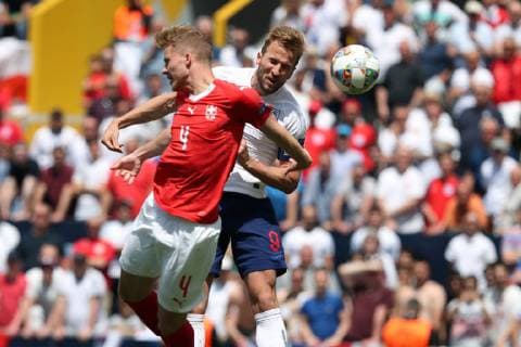 June 9, 2019 - Guimaraes, Portugal - Harry Kane of England (R ) vies with Switzerland s defender Nico Elvedi during the UEFA Nations League Third-place football match between Switzerland and England, at the Dom Afonso Henriques stadium in Guimaraes, Portugal, on June 9, 2019. Switzerland vs England - UEFA Nations League Third-place match  - ZUMAn230 20190609_zaa_n230_073 Copyright: xPedroxFiuzax