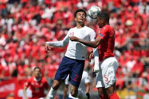 June 9, 2019 - Guimaraes, Portugal - Dele Alli of England (L) heads the ball with Switzerland s defender Manuel Akanji (R ) during the UEFA Nations League Third-place football match between Switzerland and England, at the Dom Afonso Henriques stadium in Guimaraes, Portugal, on June 9, 2019. Switzerland vs England - UEFA Nations League Third-place match  - ZUMAn230 20190609_zaa_n230_076 Copyright: xPedroxFiuzax