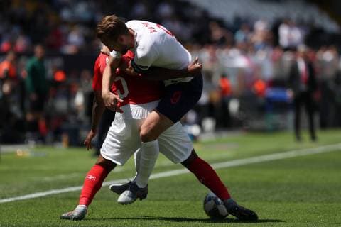 June 9, 2019 - Guimaraes, Portugal - Harry Kane of England (R ) vies with Switzerland s defender Manuel Akanji during the UEFA Nations League Third-place football match between Switzerland and England, at the Dom Afonso Henriques stadium in Guimaraes, Portugal, on June 9, 2019. Switzerland vs England - UEFA Nations League Third-place match  - ZUMAn230 20190609_zaa_n230_077 Copyright: xPedroxFiuzax