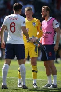 Switzerland v England UEFA Nations League 3rd Place Play-off Harry Maguire of England, Jordan Pickford of England and Harry Kane of England at the end of the UEFA Nations League 3rd Place Play-off match at Estadio D. Afonso Henrique, Guimaraes Content Not Available For UK Newspapers Copyright: xPaulxChestertonx FIL-13338-0044