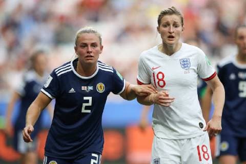 Kirsty Smith of Scotland and Ellen White of England during the FIFA Women s World Cup match at Allianz Riviera Stadium, Nice. Picture date: 9th June 2019. Picture credit should read: Jonathan Moscrop Sportimage EDITORIAL USE ONLY. No use with unauthorised audio, video, data, fixture lists, club league logos or live services. Online in-match use limited to 120 images, no video emulation. No use in betting, games or single club league player publications. SPI-0094-0061
