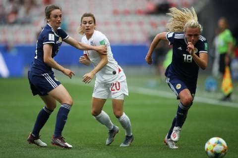 Chloe Arthur of Scotland holds off Karen Carney of England as Claire Emslie of Scotland pursues the ball during the FIFA Women s World Cup match at Allianz Riviera Stadium, Nice. Picture date: 9th June 2019. Picture credit should read: Jonathan Moscrop Sportimage EDITORIAL USE ONLY. No use with unauthorised audio, video, data, fixture lists, club league logos or live services. Online in-match use limited to 120 images, no video emulation. No use in betting, games or single club league player publications. SPI-0094-0065