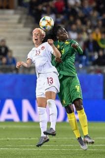(190611) -- MONTPELLIER, June 11, 2019 (Xinhua) -- Sophie Schmidt (L) of Canada vies with Marlyse Ngo Ndoumbouk of Cameroon during the group E match between Canada and Cameroon at the 2019 FIFA Women s World Cup in Montpellier, France on June 10, 2019. Canada won 1-0. (Xinhua Chen Yichen) (SP)FRANCE-MONTPELLIER-2019 FIFA WOMEN S WORLD CUP-GROUP E-CANADA VS CAMEROON 
