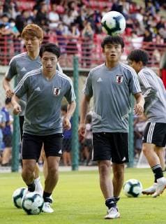 Football: Takefusa Kubo Japan s Takefusa Kubo (front R) and Gaku Shibasaki (front L) train in Sao Paulo on June 13, 2019, for an upcoming Copa America group-stage match against Chile. The 18-year-old Kubo is set to depart FC Tokyo for a move to Real Madrid, sources close to the matter said on June 14. 