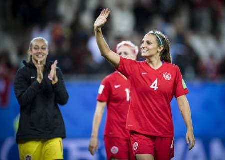 (190616) -- GRENOBLE, June 16, 2019 (Xinhua) -- Shelina Zadorsky (R) of Canada greets the spectators after the group E match between Canada and New Zealand at the 2019 FIFA Women s World Cup in Grenoble, France on June 15, 2019. Canada won 2-0. (Xinhua Xiao Yijiu) (SP)FRANCE-GRENOBLE-2019 FIFA WOMEN S WORLD CUP-GROUP E-CANADA VS NEW ZEALAND 
