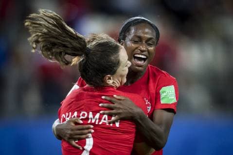 (190616) -- GRENOBLE, June 16, 2019 (Xinhua) -- Nichelle Prince (R) of Canada celebrates with Allysha Chapman during the group E match between Canada and New Zealand at the 2019 FIFA Women s World Cup in Grenoble, France on June 15, 2019. Canada won 2-0. (Xinhua Xiao Yijiu) (SP)FRANCE-GRENOBLE-2019 FIFA WOMEN S WORLD CUP-GROUP E-CANADA VS NEW ZEALAND 