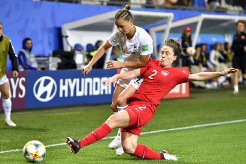 (190616) -- GRENOBLE, June 16, 2019 (Xinhua) -- Allysha Chapman (R) of Canada vies with Ria Percival of New Zealand during the group E match between Canada and New Zealand at the 2019 FIFA Women s World Cup in Grenoble, France on June 15, 2019. Canada won 2-0. (Xinhua Chen Yichen) (SP)FRANCE-GRENOBLE-2019 FIFA WOMEN S WORLD CUP-GROUP E-CANADA VS NEW ZEALAND 