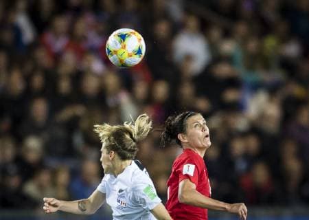 (190616) -- GRENOBLE, June 16, 2019 (Xinhua) -- Rebekah Stott (L) of New Zealand vies with Christine Sinclair of Canada during the group E match between Canada and New Zealand at the 2019 FIFA Women s World Cup in Grenoble, France on June 15, 2019. Canada won 2-0. (Xinhua Xiao Yijiu) (SP)FRANCE-GRENOBLE-2019 FIFA WOMEN S WORLD CUP-GROUP E-CANADA VS NEW ZEALAND 