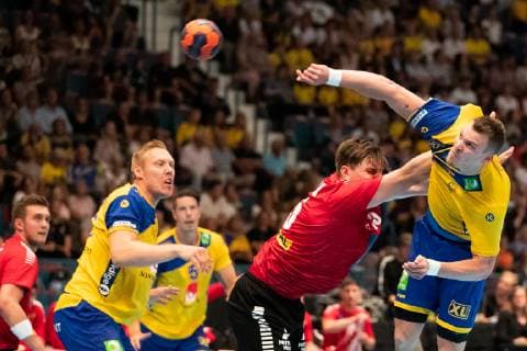 Handball, EHF EURO Cup, Schweden - Österreich 190616 Daniel Dicker of Austria and Markus Olsson of Sweden during the EHF EURO CUP match between Sweden and Austria on June 16, 2019 in Stockholm. Copyright: ANDREASxLxERIKSSON BB190616AE007