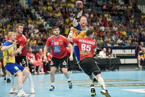 Handball, EHF EURO Cup, Schweden - Österreich Sweden s Jim Gottfridsson (top R) is challenged by Austria s Tobias Wagner (55) and Lukas Herburger (85) during the EHF Euro Cup handball match between Sweden and Austria at Hovet arena in Stockholm, Sweden, on June 16, 2019. STOCKHOLM SWEDEN HANDBALL x10070x