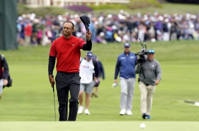 Golf: U.S. Open final round Tiger Woods of the United States acknowledges the gallery as he walks toward the 18th green during the final round of the U.S. Open at Pebble Beach Golf Links in Pebble Beach, California, on June 16, 2019. 