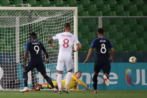 Dean Henderson of England saves a penalty from Moussa Dembele of France during the UEFA Under-21 Championship 2019 match at Dino Manuzzi, Cesena. Picture date: 18th June 2019. Picture credit should read: Jonathan Moscrop Sportimage EDITORIAL USE ONLY. No use with unauthorised audio, video, data, fixture lists, club league logos or live services. Online in-match use limited to 120 images, no video emulation. No use in betting, games or single club league player publications. SPI-0101-0017