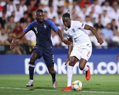 Aaron Wan Bissaka of England and Fode Ballo-Â­Toure of France during the UEFA Under-21 Championship 2019 match at Dino Manuzzi, Cesena. Picture date: 18th June 2019. Picture credit should read: Jonathan Moscrop Sportimage EDITORIAL USE ONLY. No use with unauthorised audio, video, data, fixture lists, club league logos or live services. Online in-match use limited to 120 images, no video emulation. No use in betting, games or single club league player publications. SPI-0101-0037
