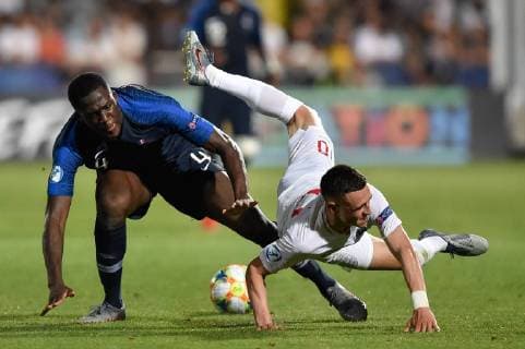 June 18, 2019 - Cesena, ITA, Italy - Phil Foden of England is challenged by Ibrahima Konate of France during the 2019 UEFA EURO, EM, Europameisterschaft,Fussball U-21 Championship match between England U-21 and France U-21 at Orogel Stadium Dino Manuzzi , Cesena, Italy on 18 June 2019. England v France: Group C - 2019 UEFA U-21 Championship  - ZUMAn230 20190618_zaa_n230_1018 Copyright: xGiuseppexMaffiax