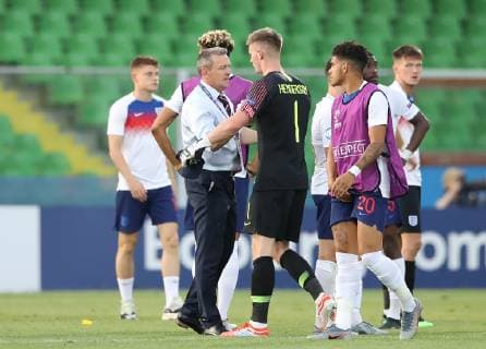 England manager Aidy Bothroyd consoles Dean Henderson of England during the UEFA Under-21 Championship 2019 match at San Marino Stadium, Serravalle. Picture date: 21st June 2019. Picture credit should read: Jonathan Moscrop Sportimage EDITORIAL USE ONLY. No use with unauthorised audio, video, data, fixture lists, club league logos or live services. Online in-match use limited to 120 images, no video emulation. No use in betting, games or single club league player publications. SPI-0103-0033