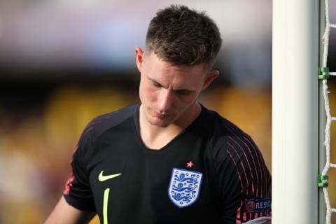 Dean Henderson of England reacts dejectedly during the UEFA Under-21 Championship 2019 match at San Marino Stadium, Serravalle. Picture date: 21st June 2019. Picture credit should read: Jonathan Moscrop Sportimage EDITORIAL USE ONLY. No use with unauthorised audio, video, data, fixture lists, club league logos or live services. Online in-match use limited to 120 images, no video emulation. No use in betting, games or single club league player publications. SPI-0103-0050