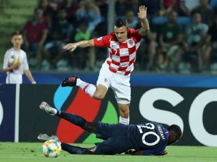 June 21, 2019 - Serravalle, Italy - Filip Uremovic of Croatia and Marcus Thuram of France during the UEFA Under 21 Championship Group C match France v Croatia at the San Marino Olimpic Stadium in Serravalle, Italy on June 21, 2019. France v Croatia - UEFA U-21 Championship  - ZUMAn230 20190621_zaa_n230_652 Copyright: xMatteoxCiambellix