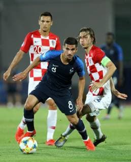June 21, 2019 - Serravalle, Italy - Houssem Aouar of France and Ivan Sunjic of Croatia in action during the UEFA Under 21 Championship Group C match France v Croatia at the San Marino Olimpic Stadium in Serravalle, Italy on June 21, 2019. France v Croatia - UEFA U-21 Championship  - ZUMAn230 20190621_zaa_n230_667 Copyright: xMatteoxCiambellix