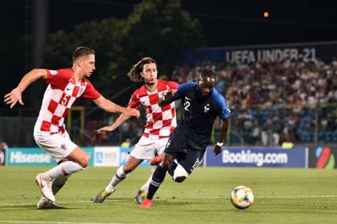 Photo Massimo Paolone LaPresse June 21, 2019 San Marino, San Marino soccer France vs Croatia - UEFA Under 21 Championship Italy 2019 - Group stage final tournament Group C - "San Marino - Serravalle" stadium. In the pic: Jonathan Ikone (Francia) competes for the ball with Nikola Katic (Croazia) and Ivan Sunjic (Croazia)  Copyright: xMassimoxPaolone LaPressex