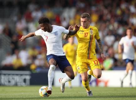 Demarai Gray of England tackled by Alexandru Cicaldau of Romania during the UEFA Under-21 Championship 2019 match at Stadio Dino Manuzzi, Cesena. Picture date: 21st June 2019. Picture credit should read: Jonathan Moscrop Sportimage EDITORIAL USE ONLY. No use with unauthorised audio, video, data, fixture lists, club league logos or live services. Online in-match use limited to 120 images, no video emulation. No use in betting, games or single club league player publications. SPI-0103-0010