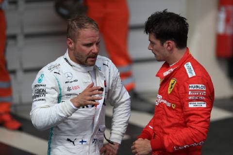 23rd June 2019, Circuit Automobile Paul Ricard, Le Castellet, Marseille, France ; FIA Formula 1 Grand Prix of France, Race Day; Mercedes AMG Petronas Motorsport, Valtteri Bottas chats with Scuderia Ferrari, Charles Leclerc  ActionPlus12147188 Octane