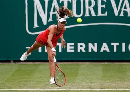 23rd June 2019, Devonshire Park, Eastbourne, England; Nature Valley International Tennis Tournament; Monica Puig (PUR) serves to Elise Mertens (BEL)  ActionPlus12147348 HongboxChen