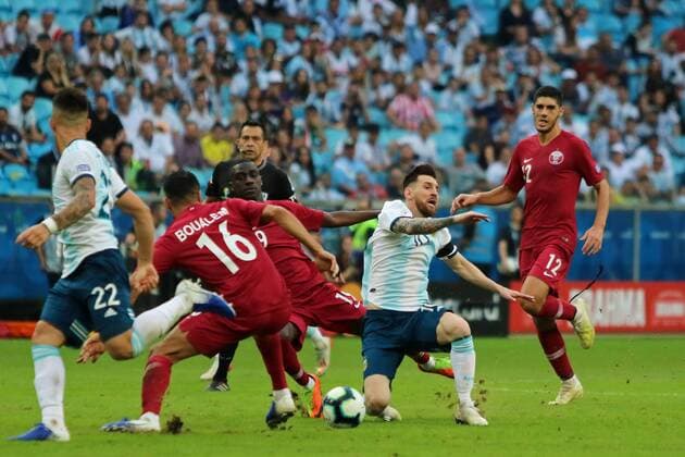 23rd June 2019; Arena do Gr& xea;mio, Porto Alegre, Rio Grande do Sul, Brazil; Copa America International football, Qatar versus Argentina; Almoez Ali of Qatar and Lionel Messi of Argentina  ActionPlus12147517 MaxxPeixoto