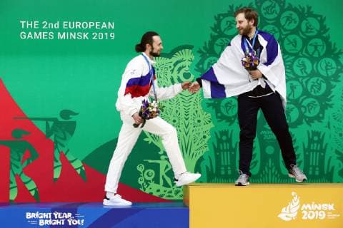 Sport Bilder des Tages MINSK, BELARUS â€“ JUNE 24, 2019: Silver medallist Sergei Kamensky (L) of Russia and medallist Sergey Richter of Israel at a victory ceremony for a men s 10m air rifle event at the Minsk 2019 Europaspiele Sergei Bobylev TASS  TS0B0B88