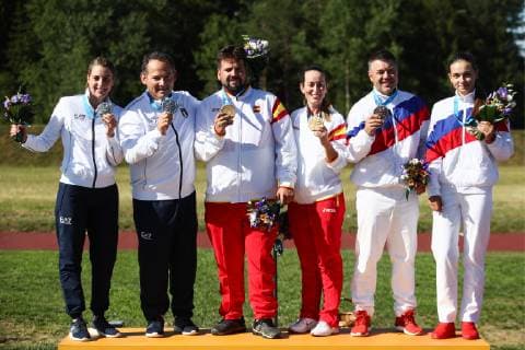 MINSK, BELARUS â€“ JUNE 24, 2019: Athletes Jessica Rossi and Giovanni Pellielo of Italy, Antonio Bailon and Fatima Galvez of Spain, Alexei Alipov and Daria Semyanova (L-R) pose with their medals at a victory ceremony following the mixed trap shooting event at the Minsk 2019 Europaspiele Sergei Bobylev TASS  TS0B0BF1