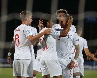 Reiss Nelson of England celebrates scoring the first goal during the UEFA Under-21 Championship 2019 match at San Marino Stadium, Serravalle. Picture date: 24th June 2019. Picture credit should read: Jonathan Moscrop Sportimage EDITORIAL USE ONLY. No use with unauthorised audio, video, data, fixture lists, club league logos or live services. Online in-match use limited to 120 images, no video emulation. No use in betting, games or single club league player publications. SPI-0105-0013