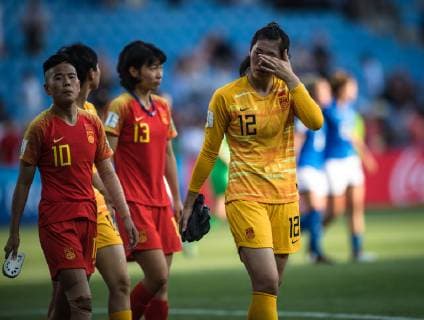 (190625) -- MONTPELLIER (FRANCE), June 25, 2019 -- Goalkeeper Peng Shimeng (1st R) of China leaves the pitch after the round of 16 match between Italy and China at the 2019 FIFA Women s World Cup in Montpellier, France, on June 25, 2019. China lost 0-2. ) (SP)FRANCE-MONTPELLIER-2019 FIFA WOMEN S WORLD CUP-ROUND OF 16-ITA VS CHN XiaoxYijiu 